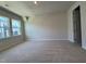 Bright bedroom with large windows and neutral carpet, creating a serene and comfortable retreat at 604 Hyperion Aly, Wake Forest, NC 27587
