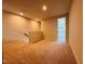 A cozy and carpeted loft area perfect for a reading nook or play area at 604 Hyperion Aly, Wake Forest, NC 27587