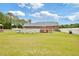 Spacious backyard with an above-ground pool and a charming brick home at 6042 Elliott Bridge Rd, Linden, NC 28356