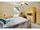 Tranquil bedroom with a large window and comfortable furnishings that creates a peaceful retreat for relaxation at 6042 Elliott Bridge Rd, Linden, NC 28356