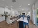 Open-concept living space featuring a gourmet kitchen, dining area, and comfortable living room at 659 White Birch Ln, Angier, NC 27501