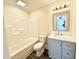 Classic bathroom with combined tub and shower and updated vanity at 668 Surl Mount Tirzah Rd, Timberlake, NC 27583