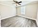 This bedroom features new vinyl flooring and a ceiling fan at 668 Surl Mount Tirzah Rd, Timberlake, NC 27583
