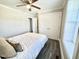 Cozy bedroom featuring a ceiling fan, neutral walls, and a large closet for ample storage at 668 Surl Mount Tirzah Rd, Timberlake, NC 27583