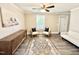 Bright living room with modern furnishings, hardwood flooring and plenty of natural light at 668 Surl Mount Tirzah Rd, Timberlake, NC 27583