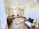 Cozy living room with neutral decor, stylish seating, and a decorative rug at 668 Surl Mount Tirzah Rd, Timberlake, NC 27583