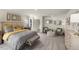 Spacious main bedroom features neutral decor, a sitting area, and an ensuite bathroom at 677 White Birch Ln, Angier, NC 27501