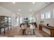 Bright, open-concept living room and dining area featuring hardwood floors and plenty of natural light at 681 Beacon Hill Rd # 38, Lillington, NC 27546