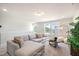 Cozy living room with a comfortable sectional sofa, bean bag, and plush carpet at 681 Beacon Hill Rd # 38, Lillington, NC 27546