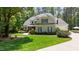 Attractive home exterior with a lush lawn and well-maintained landscaping at 7400 Portpatrick Ct, Wake Forest, NC 27587