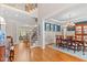 Open-concept design featuring the foyer with stairs, dining room, and living space at 7400 Portpatrick Ct, Wake Forest, NC 27587