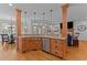 Large kitchen featuring an open layout, granite countertops, a stainless steel dishwasher, and wood cabinetry at 7400 Portpatrick Ct, Wake Forest, NC 27587