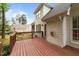 Home's back wooden deck view of the yard and the neighborhood homes at 7405 Pine Summit Dr, Fuquay Varina, NC 27526