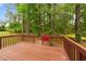 This beautiful wooden back deck sits amongst a lovely wooded lot at 7405 Pine Summit Dr, Fuquay Varina, NC 27526