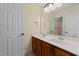 Bathroom featuring a double vanity with a large mirror and ample lighting at 7405 Pine Summit Dr, Fuquay Varina, NC 27526