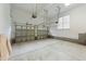 Spacious garage with ample room for parking and storage, perfect for car enthusiasts or hobbyists at 7405 Pine Summit Dr, Fuquay Varina, NC 27526