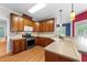 Well-equipped kitchen with modern appliances, ample counter space, and natural light for culinary enjoyment at 7405 Pine Summit Dr, Fuquay Varina, NC 27526