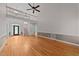Spacious living room with a soaring ceiling and a catwalk with wood flooring at 7405 Pine Summit Dr, Fuquay Varina, NC 27526