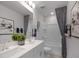Bright bathroom featuring double sinks, modern fixtures, and decorative accents at 741 Deschutes Dr, Garner, NC 27529