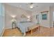 Serene main bedroom featuring a queen bed, soft lighting, and view to the en suite at 7705 Astoria Pl, Raleigh, NC 27612