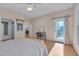 Spacious main bedroom offers a bed, an ensuite bathroom, and a view to the deck at 7705 Astoria Pl, Raleigh, NC 27612