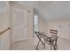 Office area with desk, overhead lighting, and a bright view at 7705 Astoria Pl, Raleigh, NC 27612