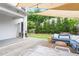 Beautiful deck with lounge seating, dining table, and shaded area for outdoor gatherings at 811 E Lane St, Raleigh, NC 27601