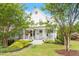 Charming two-story home with landscaped yard and inviting front porch at 811 E Lane St, Raleigh, NC 27601