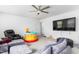 Bright living room with a comfortable seating arrangement and entertainment area at 1009 Haynoke Dr, Graham, NC 27253