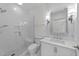 Modern bathroom featuring a walk-in shower with built in bench and vanity at 10410 Rosegate Ct, Raleigh, NC 27617