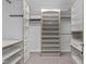 Organized closet with adjustable shelving and drawers maximizes space and functionality at 10410 Rosegate Ct, Raleigh, NC 27617