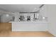 Bright kitchen features granite counters, stainless steel appliances, and modern cabinetry at 10410 Rosegate Ct, Raleigh, NC 27617