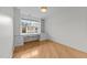 Office nook featuring built-in shelving and a large window at 10410 Rosegate Ct, Raleigh, NC 27617