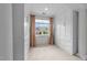 Large walk-in closet with built-in storage and natural light at 10410 Rosegate Ct, Raleigh, NC 27617