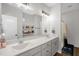 Bathroom with a double sink vanity, and modern fixtures at 109 E Fayetteville St, Micro, NC 27555
