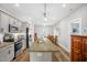 Spacious kitchen with granite island and adjoining dining area at 109 E Fayetteville St, Micro, NC 27555