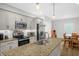 Modern kitchen with stainless steel appliances and granite countertops at 109 E Fayetteville St, Micro, NC 27555