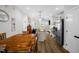 Open concept living and kitchen area with modern appliances and wood flooring at 109 E Fayetteville St, Micro, NC 27555