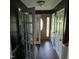 Inviting entryway with hardwood floors, decorative doors, and a view of the front door at 1102 Parkwood Dr, Siler City, NC 27344