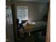 Room featuring a tanning bed, suggesting a personal spa or recreational area within the home at 1102 Parkwood Dr, Siler City, NC 27344