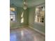 This bedroom features unique checkered floors, natural lighting from two windows and an overhead fan at 112 Hilton Ave, Durham, NC 27707