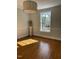Bright dining room with large window, wood floors, and decorative architectural features at 112 Hilton Ave, Durham, NC 27707