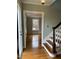 Open entryway with hardwood floors and view into a living room at 112 Hilton Ave, Durham, NC 27707