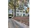 Exterior of home with a tree-lined yard at 112 Hilton Ave, Durham, NC 27707