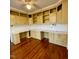 Spacious office featuring extensive built-in cabinetry and a large workspace at 112 Hilton Ave, Durham, NC 27707