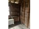 An interior view of the shed showing built-in shelving at 112 Hilton Ave, Durham, NC 27707