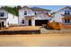 New home construction with Tyvek wrap, showcasing the early stages of the build at 1139 Winding Spring Dr, Mebane, NC 27302