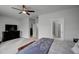 The main bedroom includes a ceiling fan and TV at 124 Shale Creek Dr, Durham, NC 27703