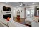 Living room with fireplace and sliding glass doors to deck at 124 Shale Creek Dr, Durham, NC 27703
