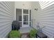 View of the back patio with a grill at 124 Shale Creek Dr, Durham, NC 27703
